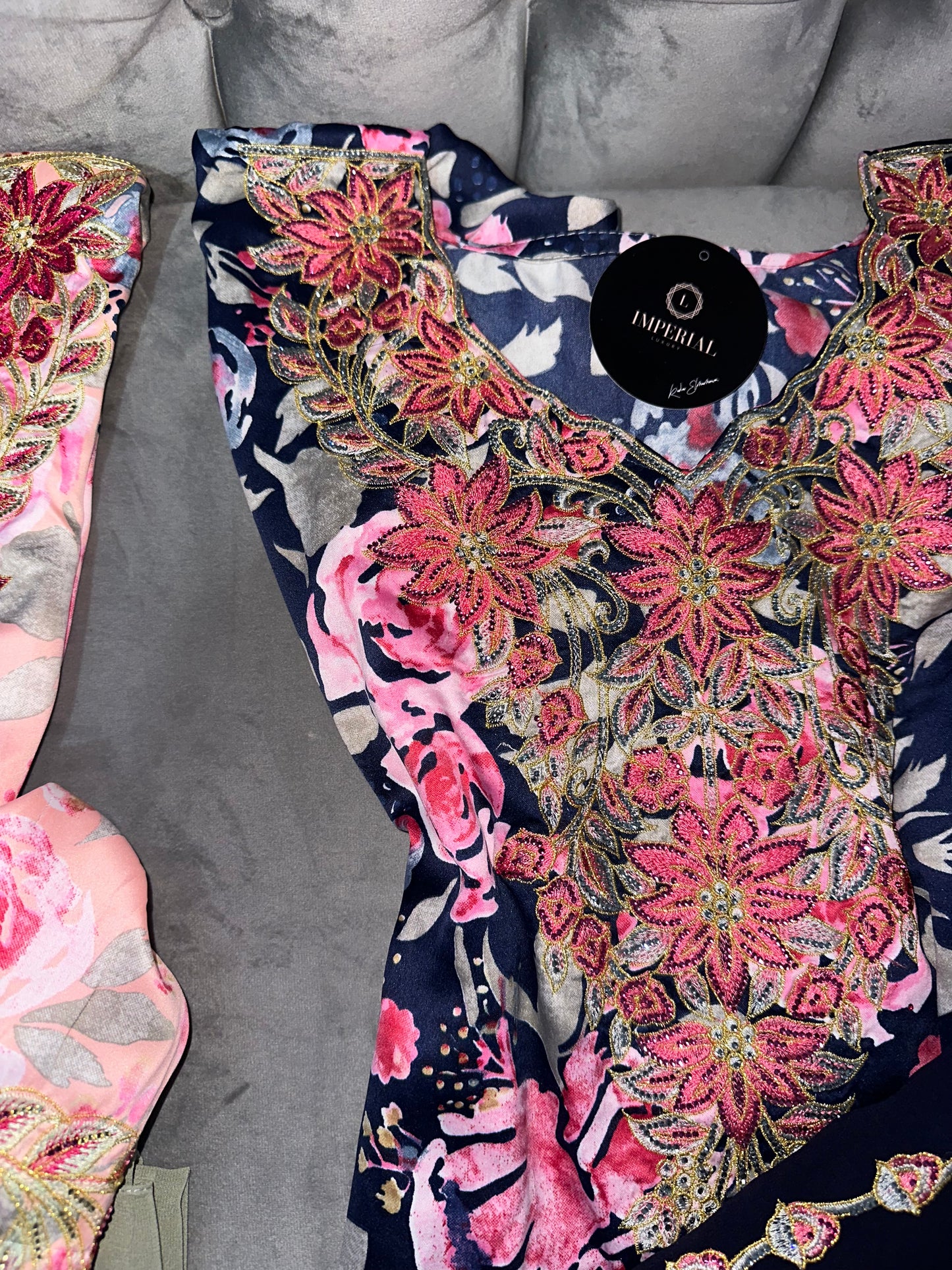 Dark blue, white, blue and pink mkhawars with matching Shiela
