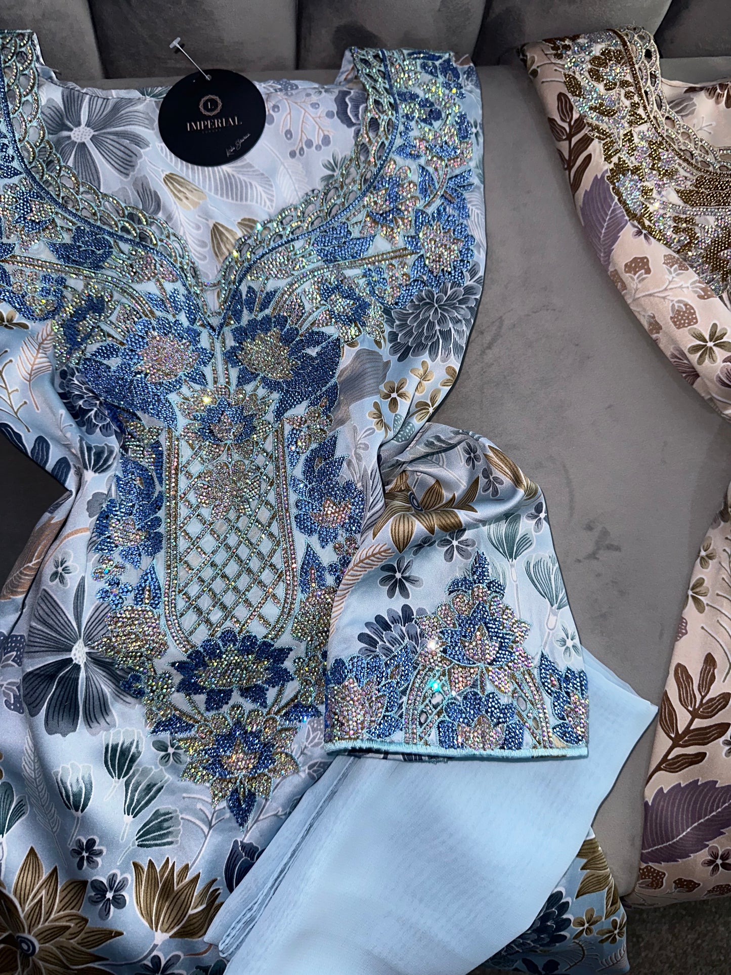 Green, grey, brown, blue and pink mkhawars with corset and matching Shiela