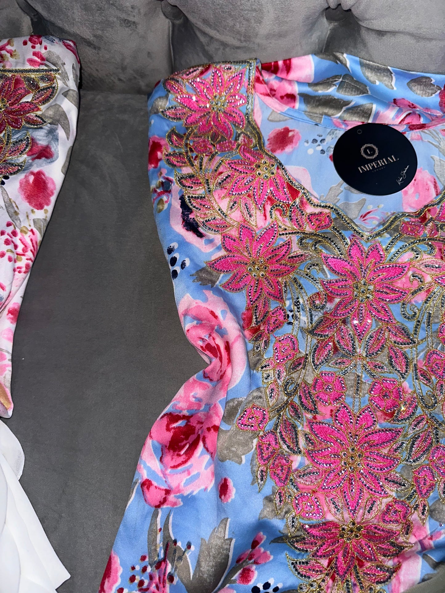 Dark blue, white, blue and pink mkhawars with matching Shiela