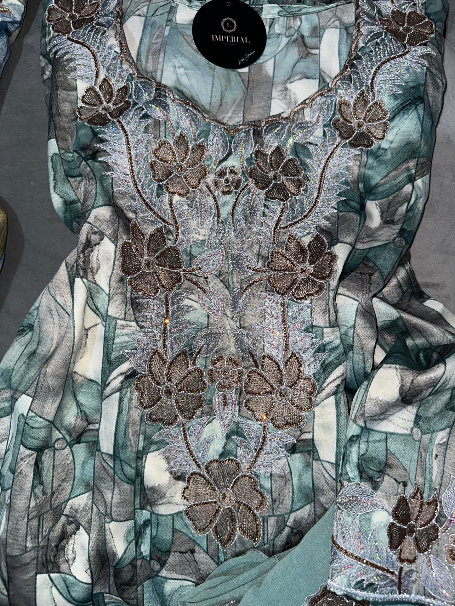 Green and blue mkhawar with matching Shiela