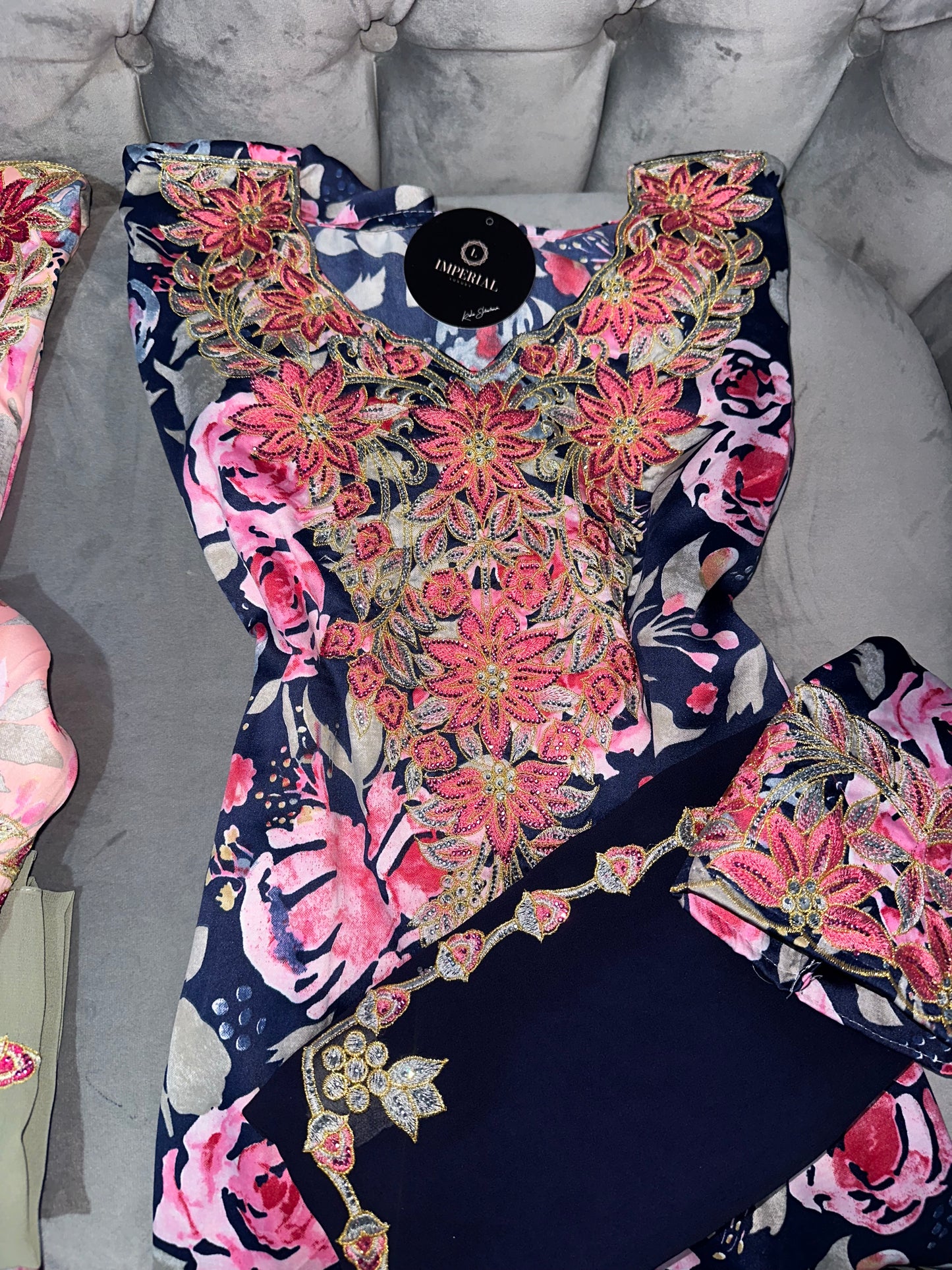 Dark blue, white, blue and pink mkhawars with matching Shiela