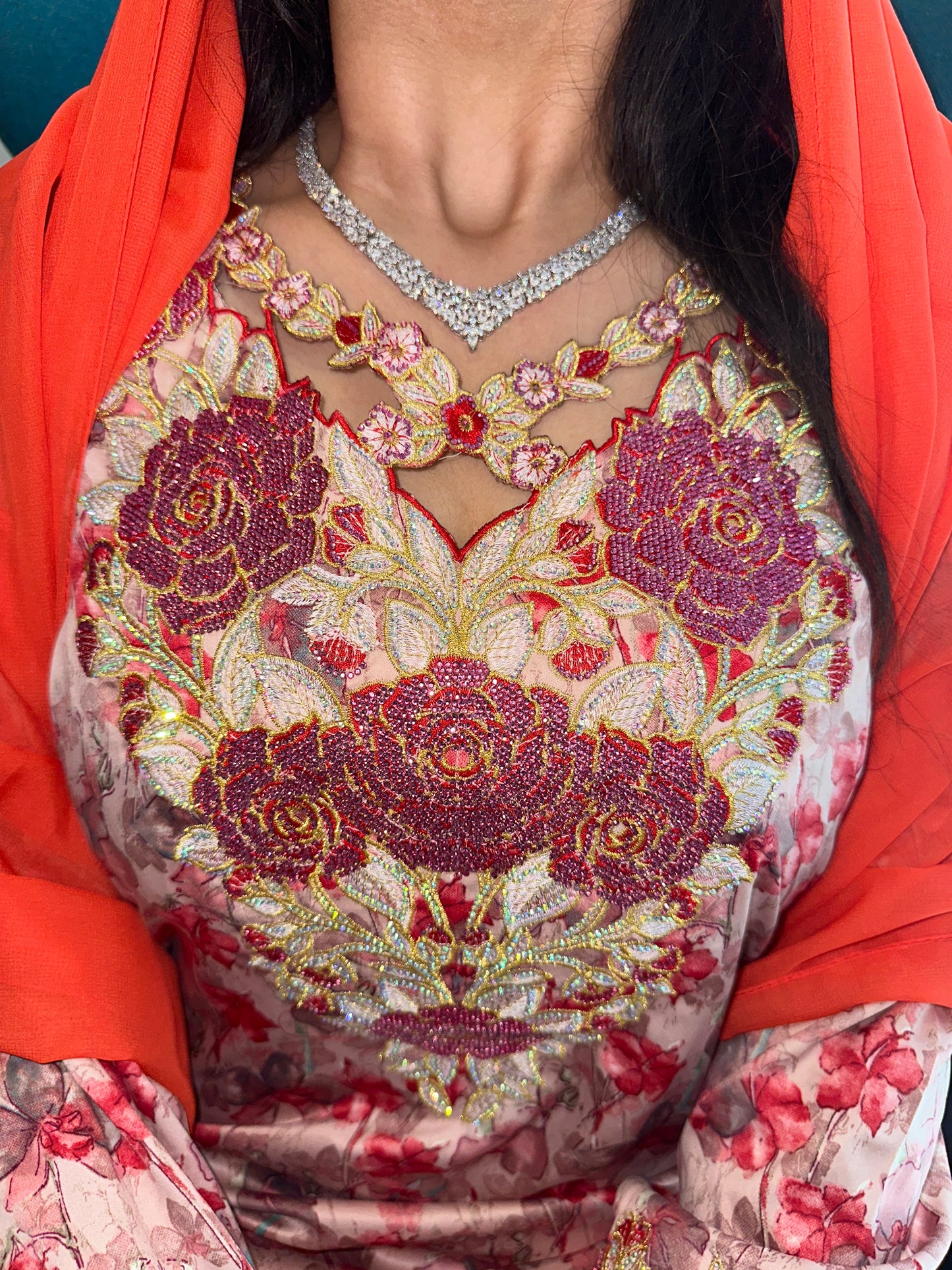 Red and orange mkhawar with matching Shiela