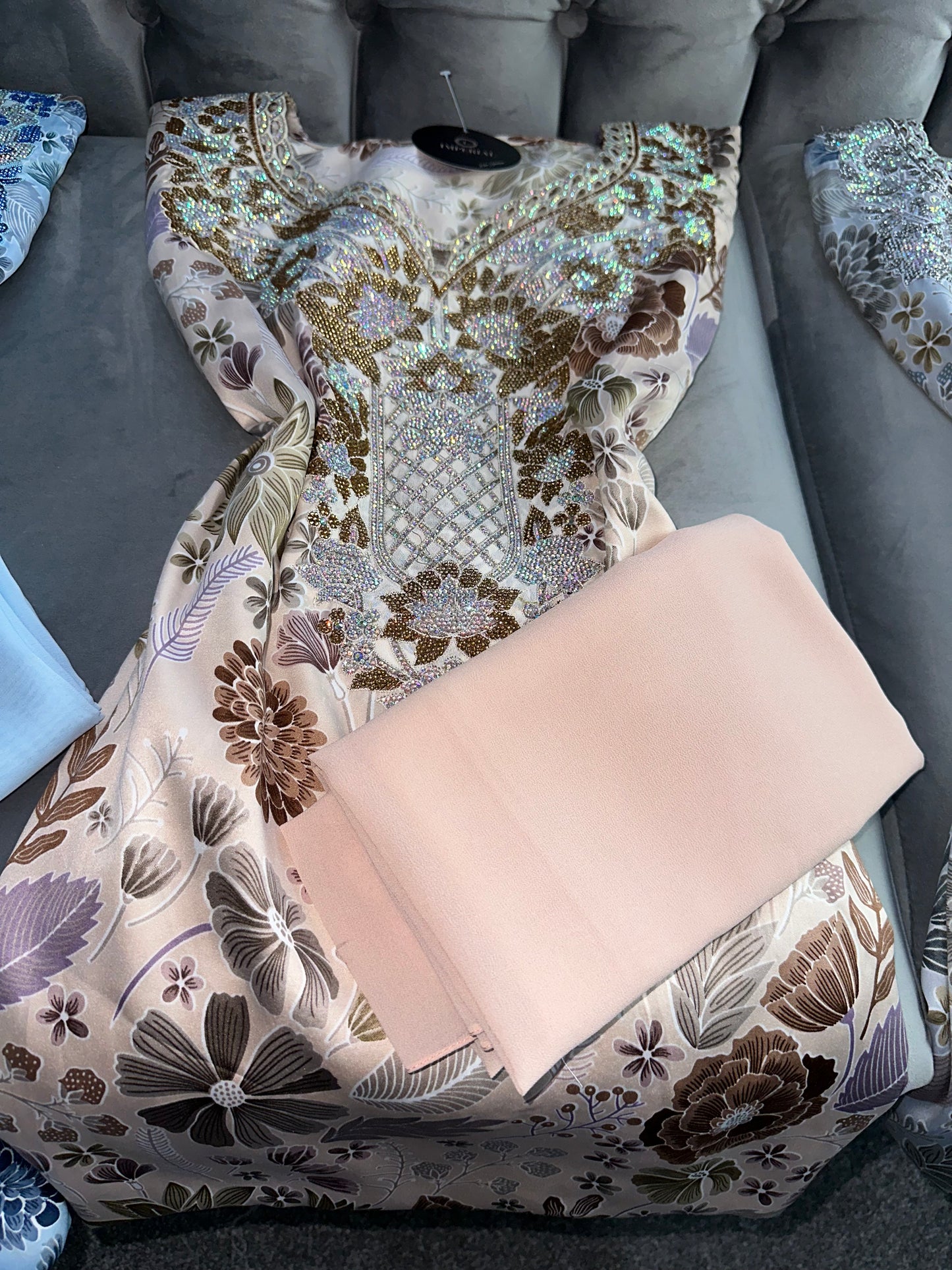 Green, grey, brown, blue and pink mkhawars with corset and matching Shiela