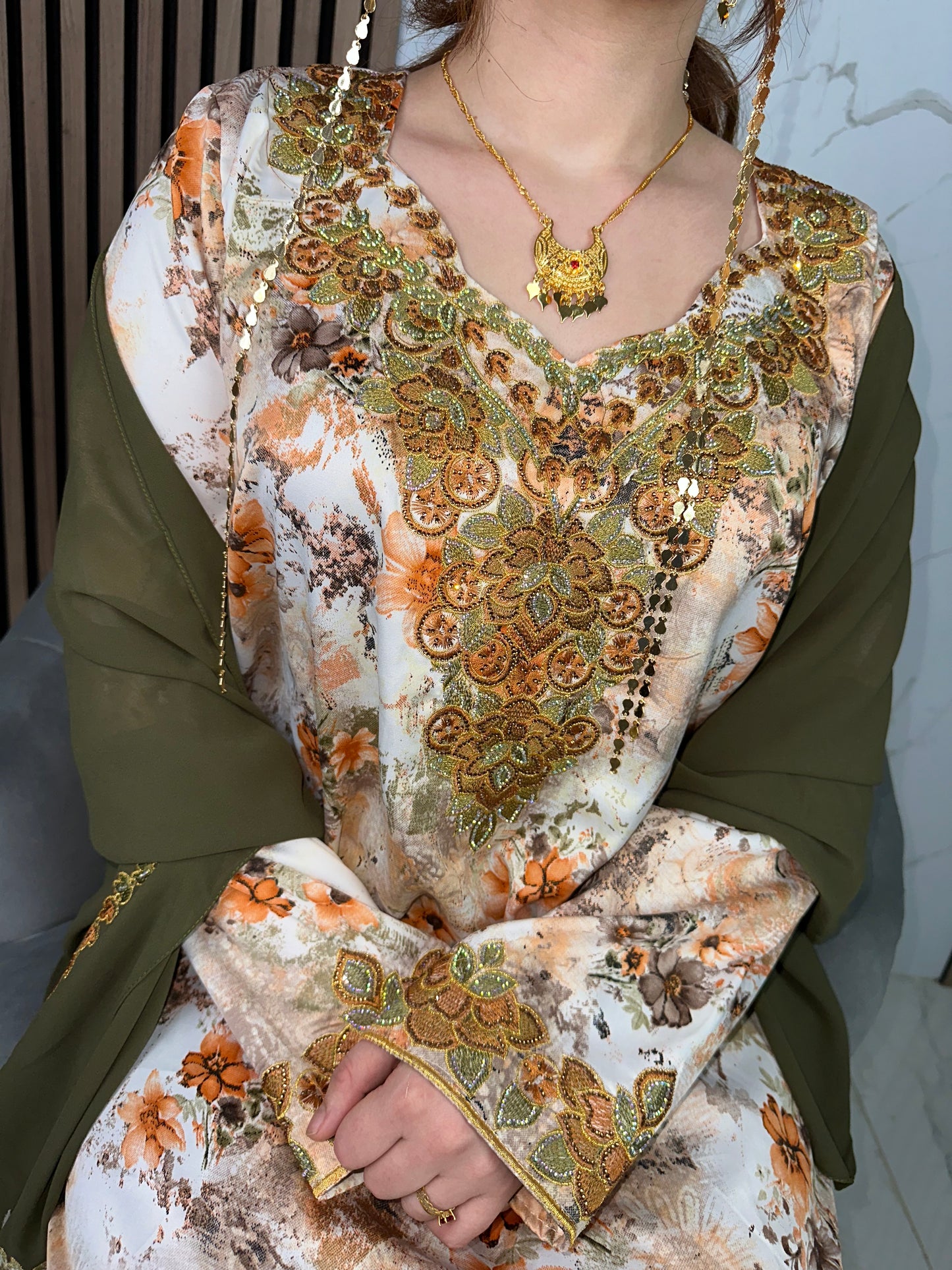 Orange and gold mkhawar with matching Sheila