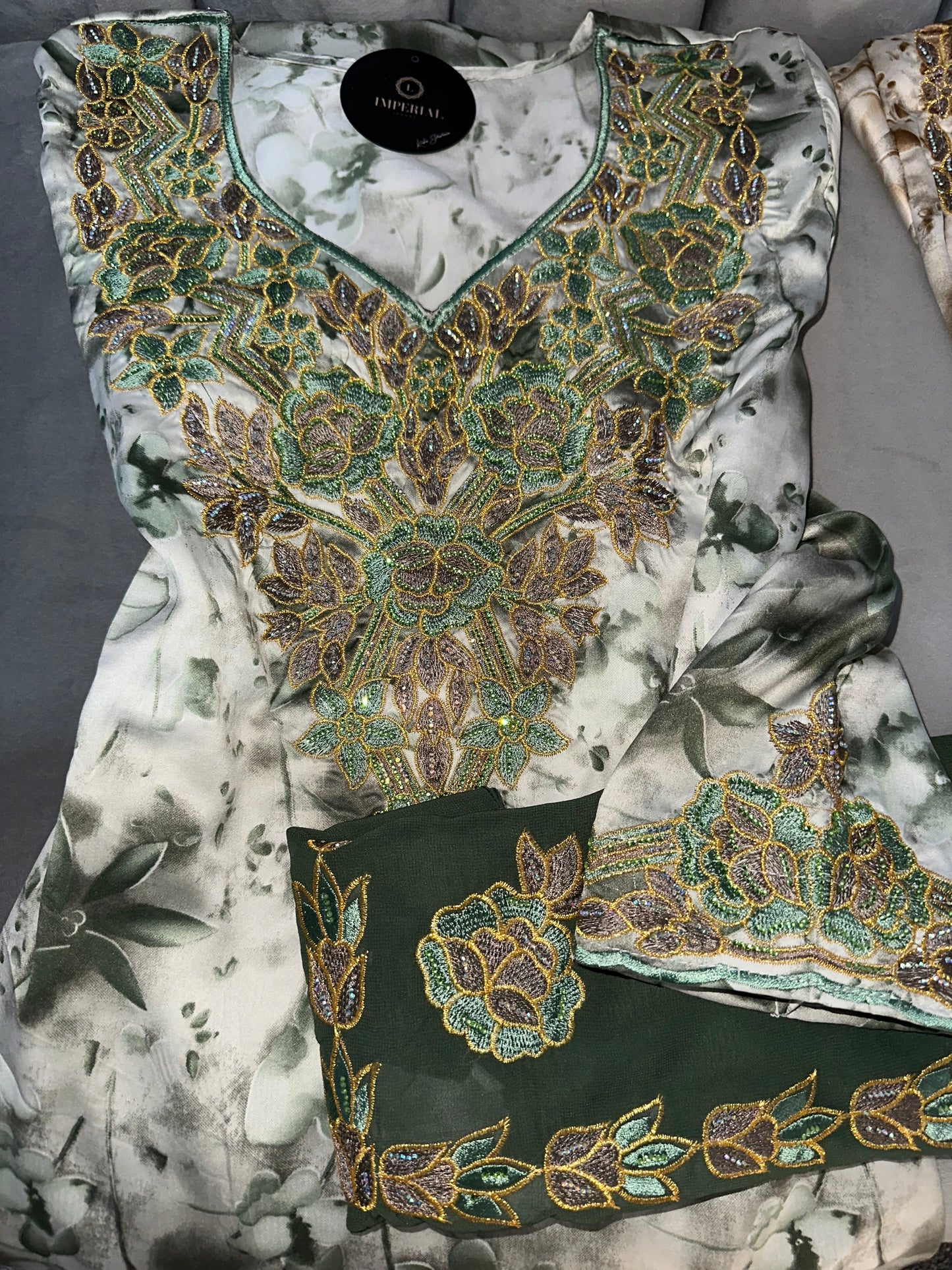 Cream, blue, green and rose mkhawars with matching Shiela