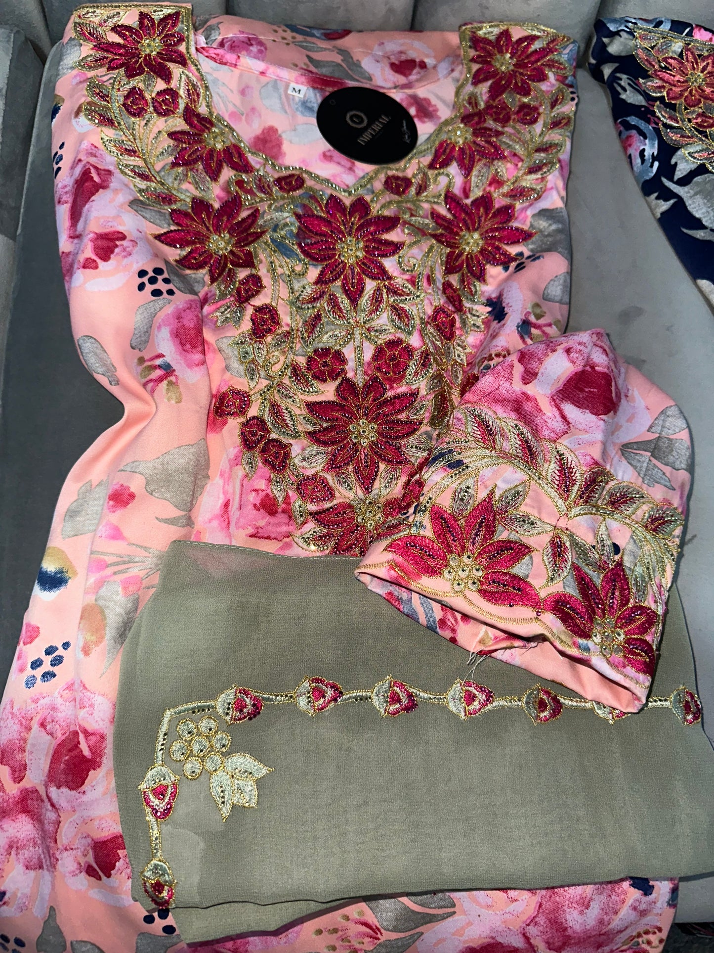 Dark blue, white, blue and pink mkhawars with matching Shiela