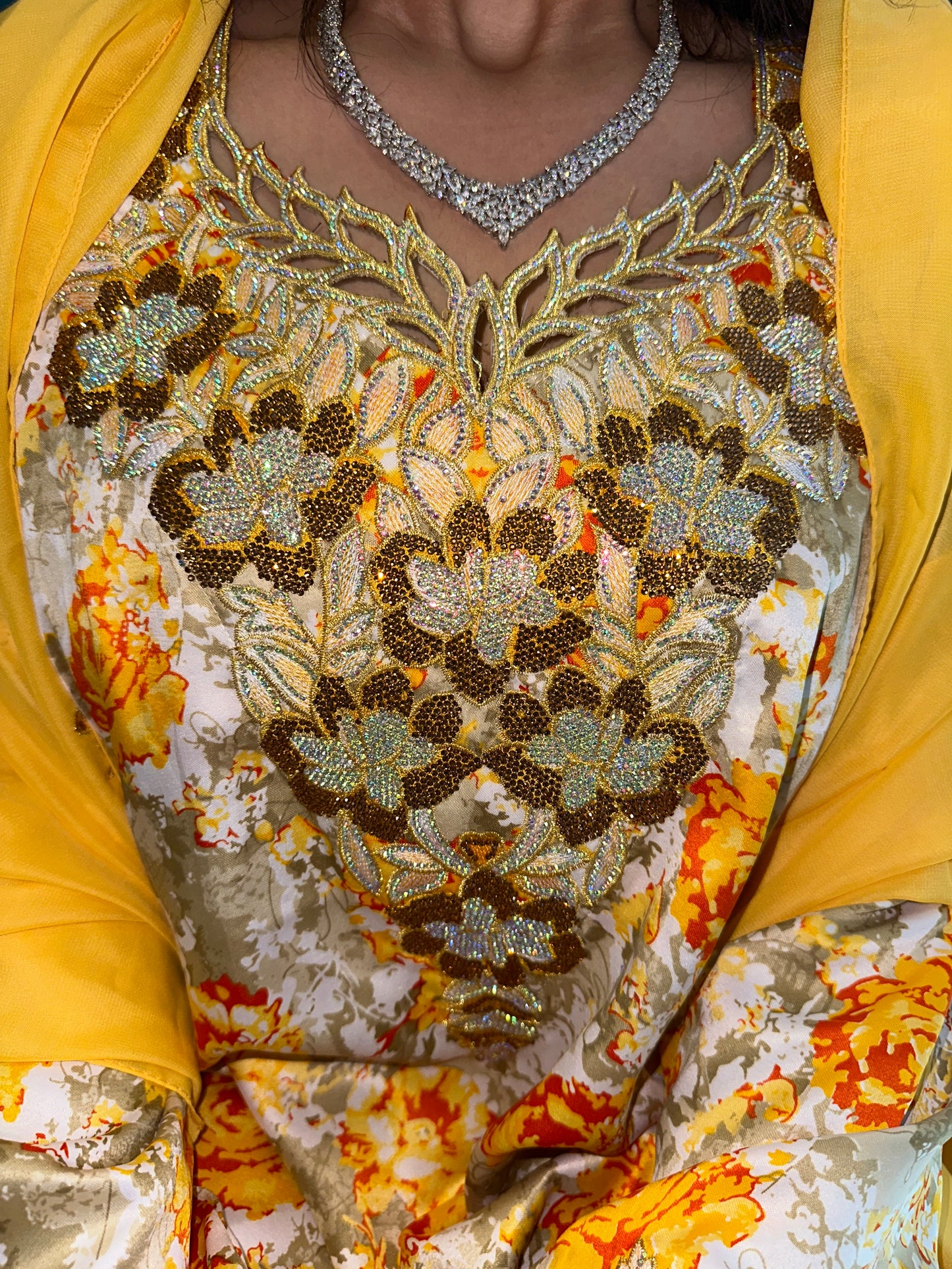 Yellow and cream mkhawar with matching Shiela