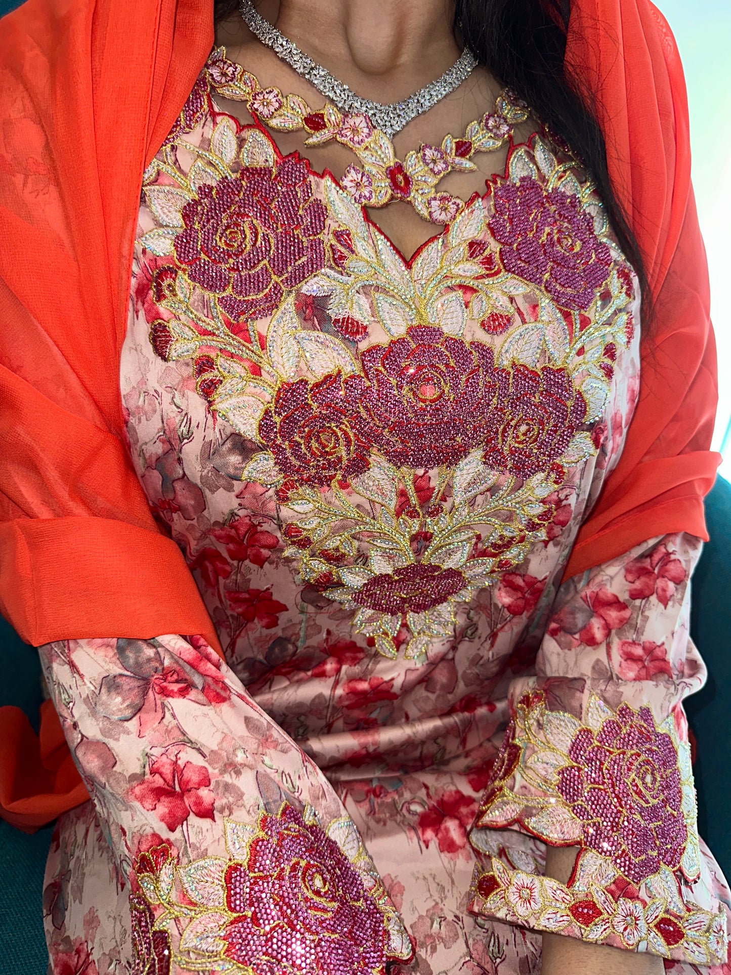 Red and orange mkhawar with matching Shiela