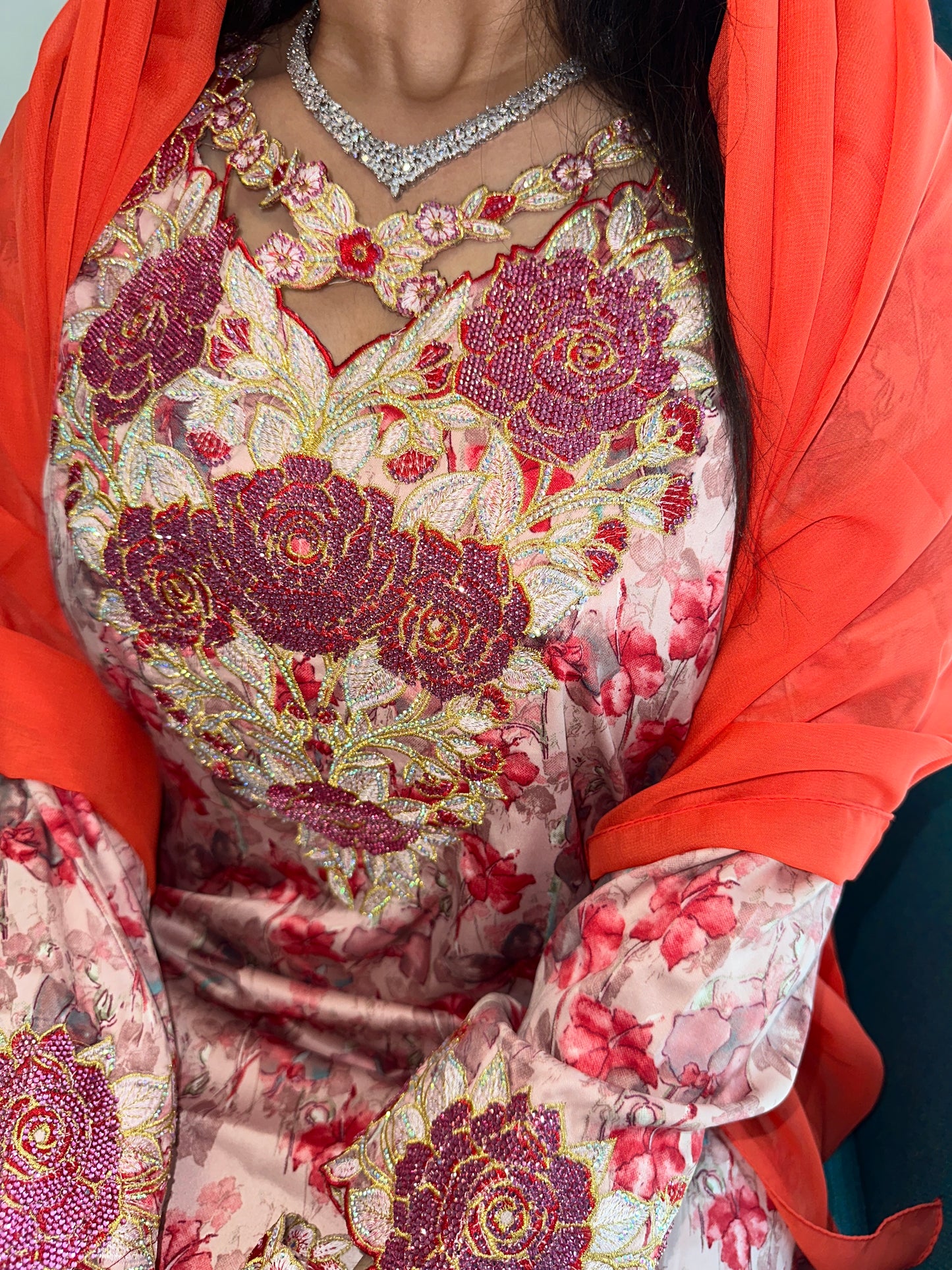 Red and orange mkhawar with matching Shiela