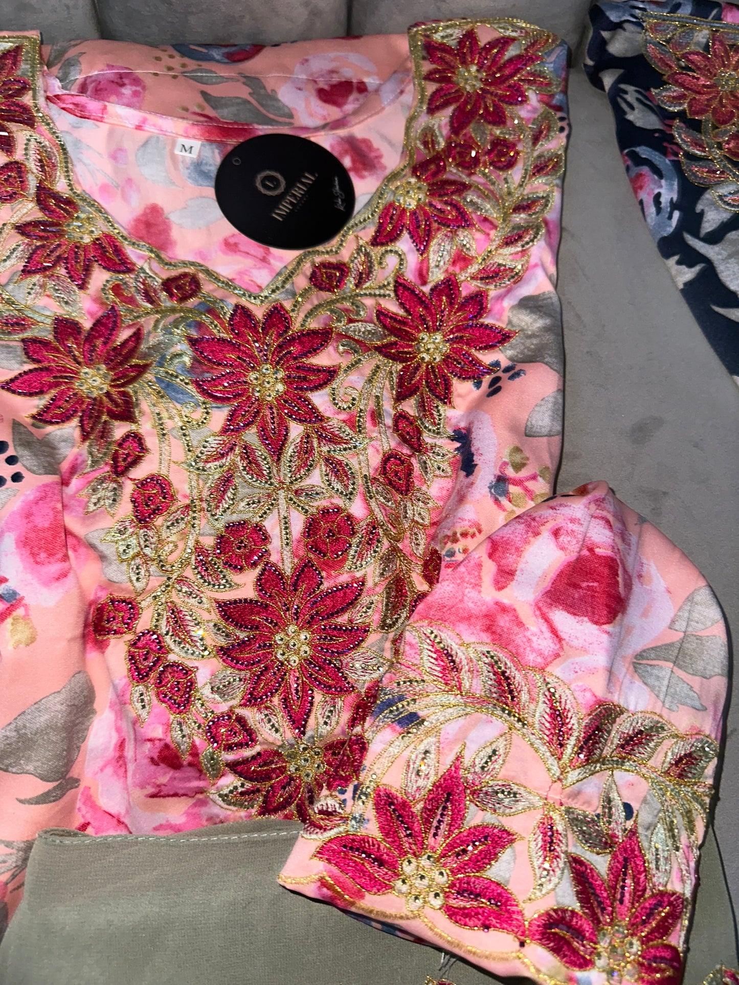 Dark blue, white, blue and pink mkhawars with matching Shiela