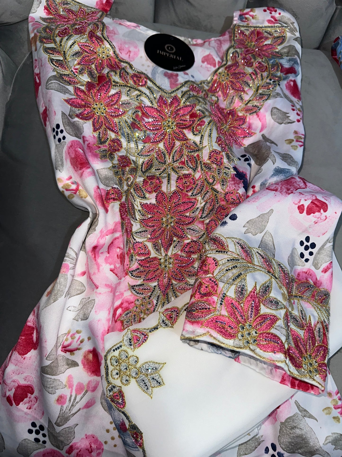 Dark blue, white, blue and pink mkhawars with matching Shiela