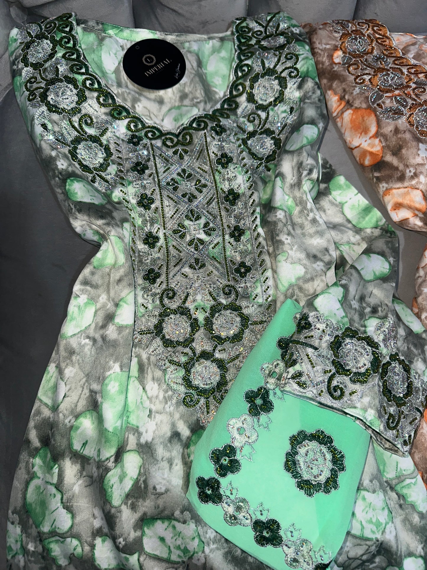 Purple, green, turquoise, red and orange mkhawar with matching Shiela and back corset