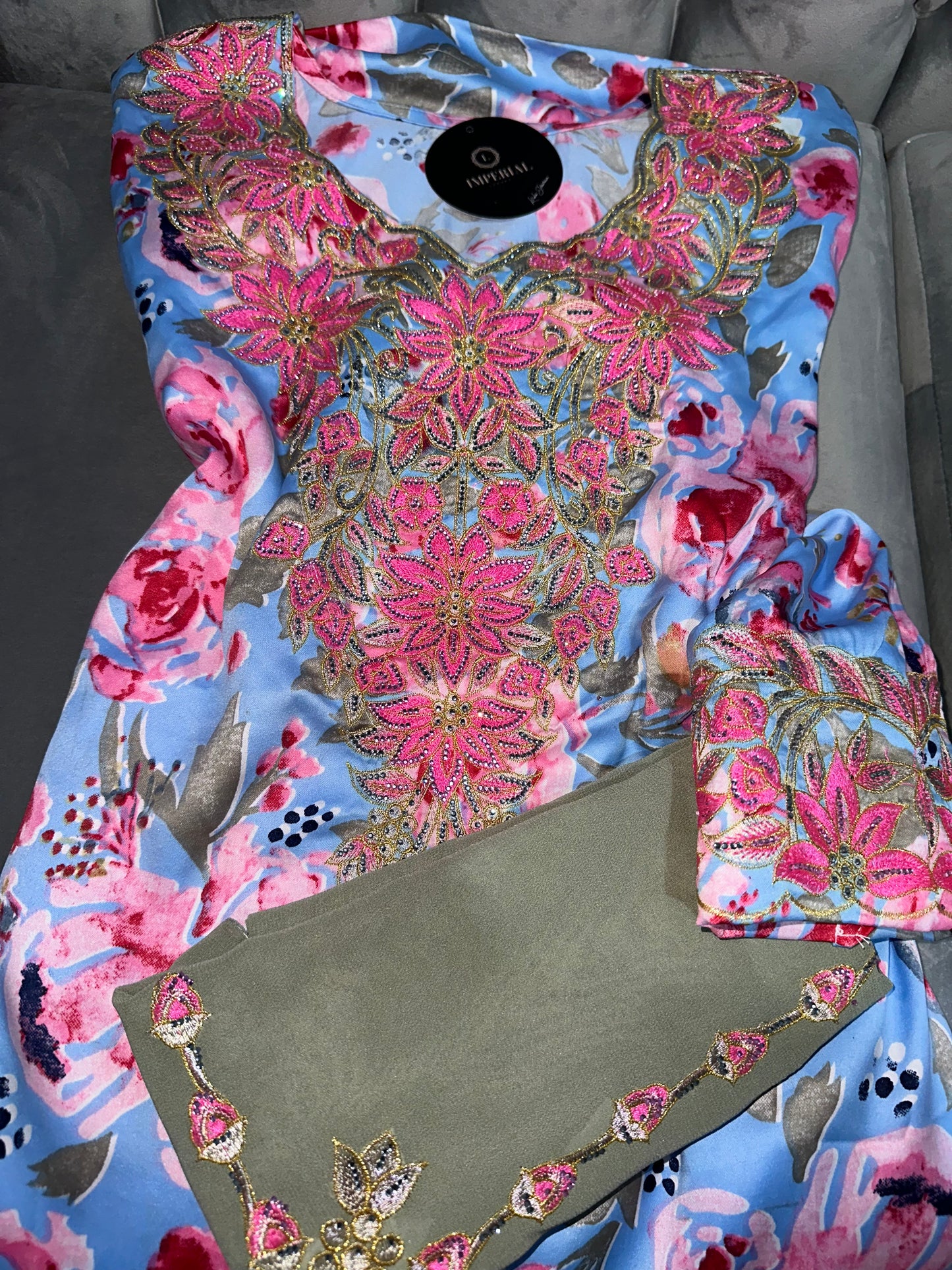 Dark blue, white, blue and pink mkhawars with matching Shiela