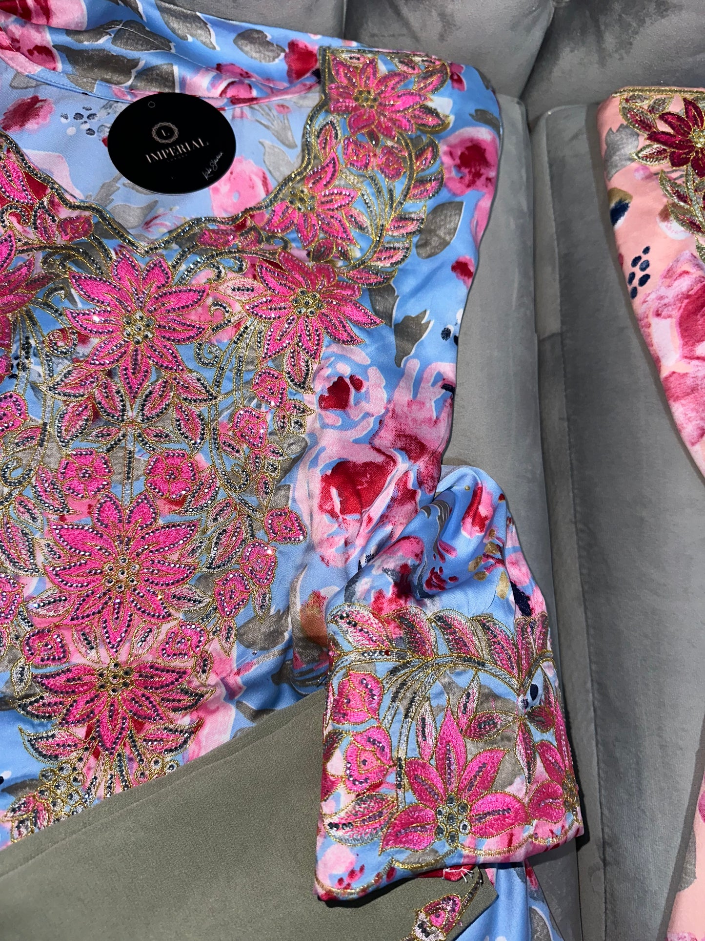 Dark blue, white, blue and pink mkhawars with matching Shiela