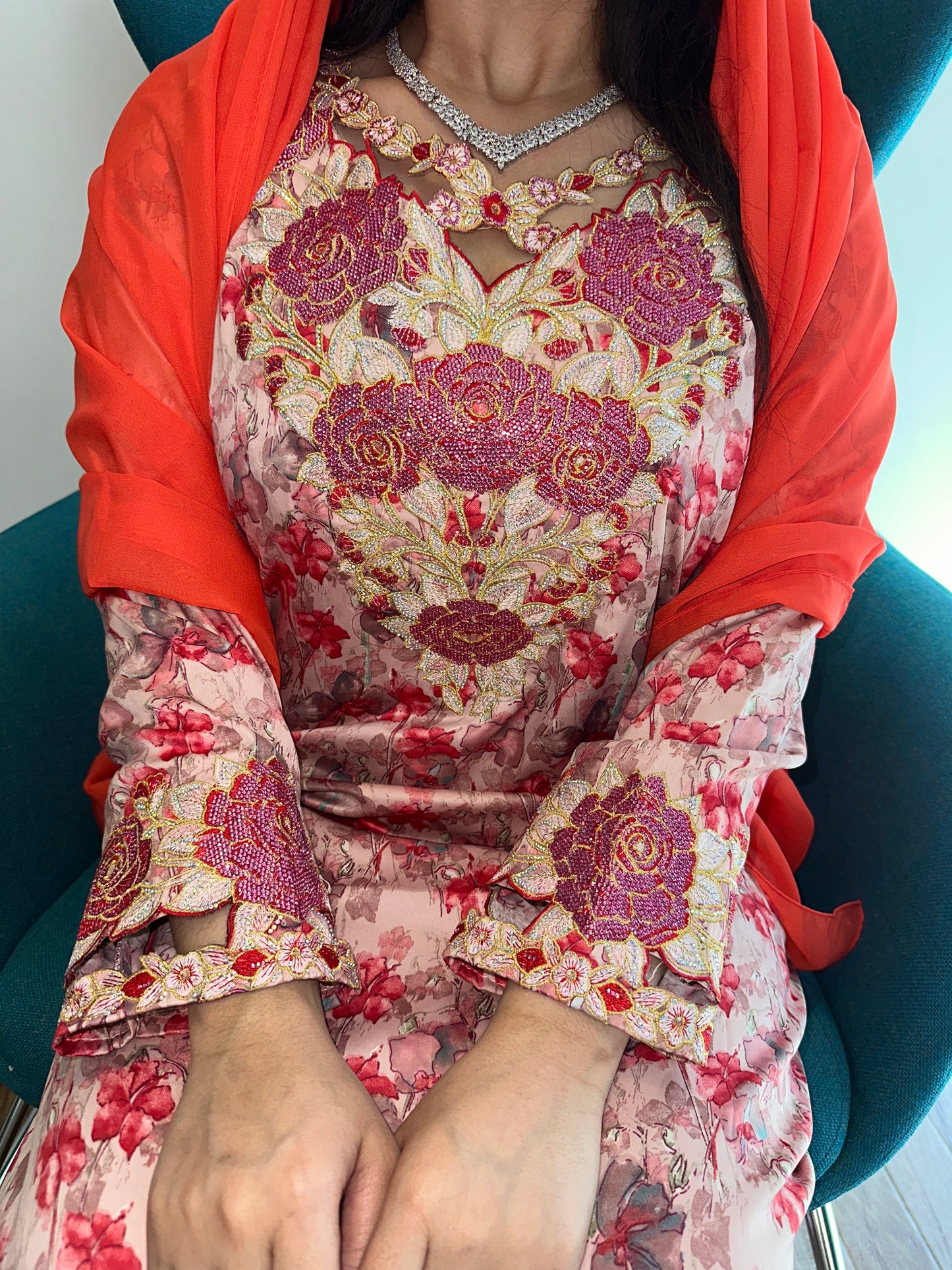 Red and orange mkhawar with matching Shiela
