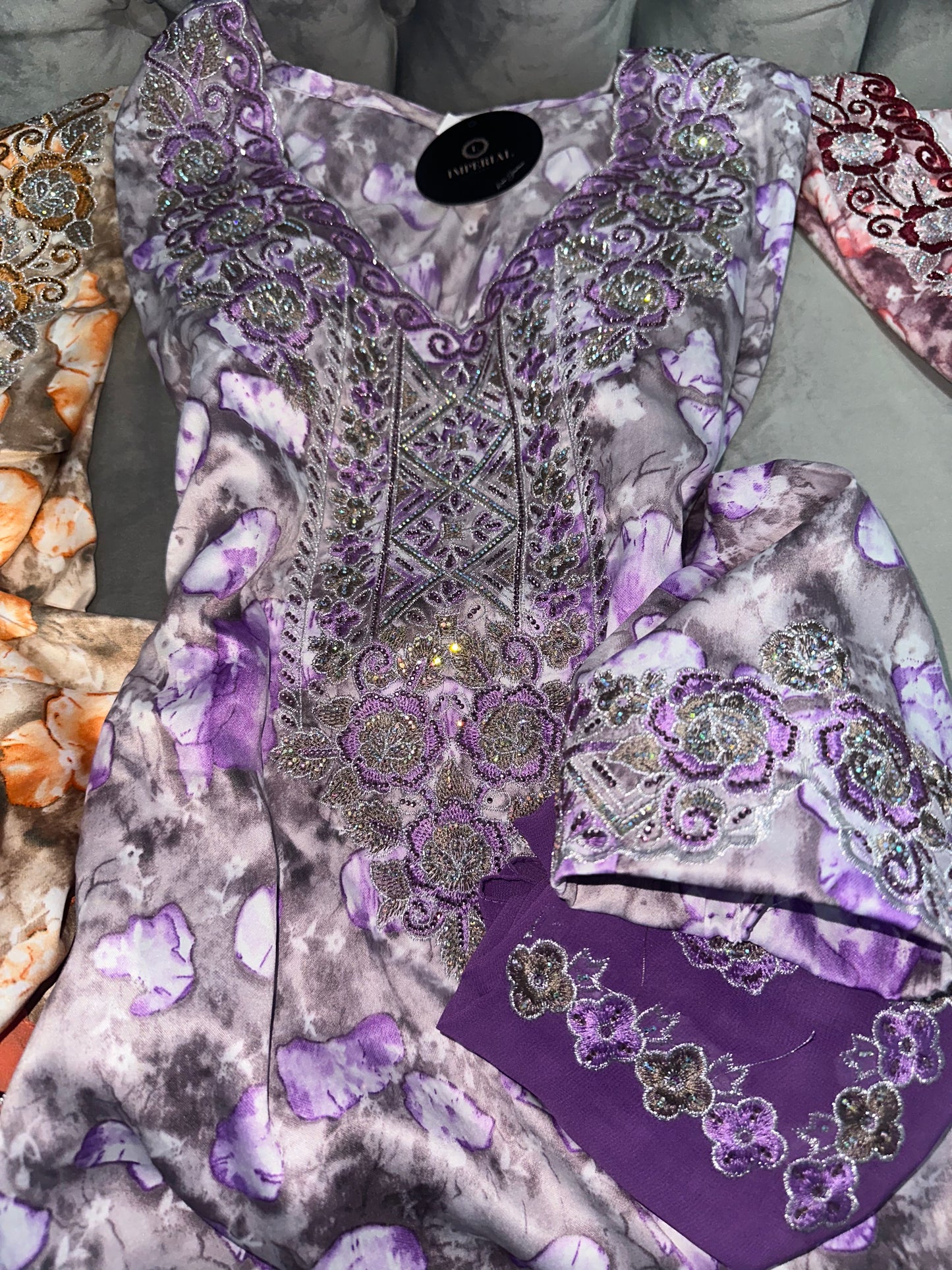 Purple, green, turquoise, red and orange mkhawar with matching Shiela and back corset