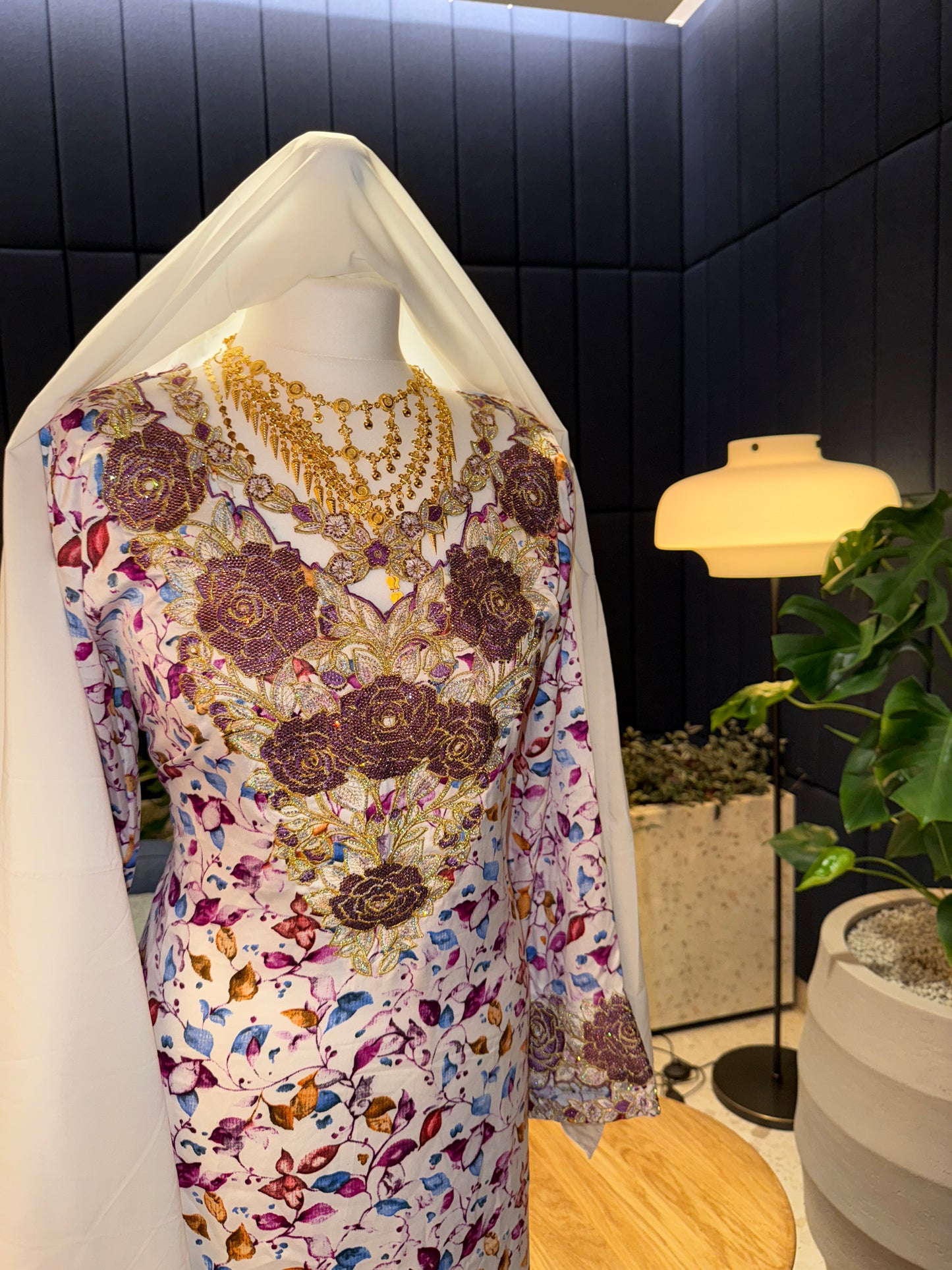 Purple and white mkhawar with hijab