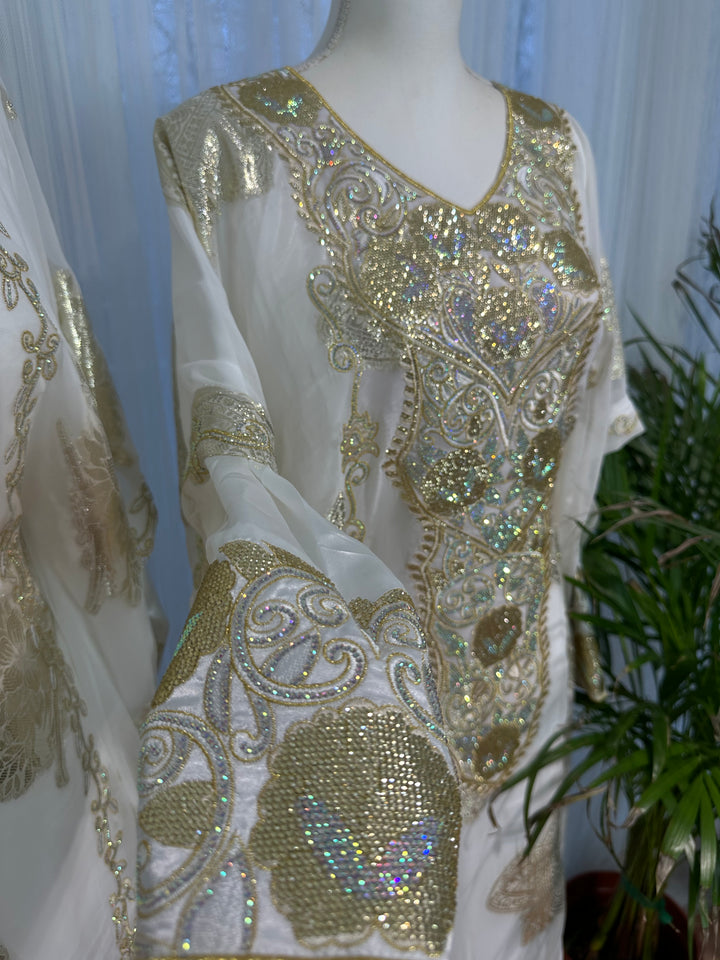 Gold and white Emirati and Arabic dress two pieces