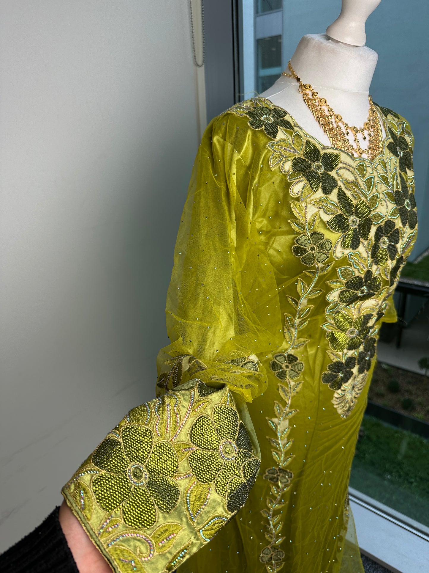Lime green Emirati thobe with belt