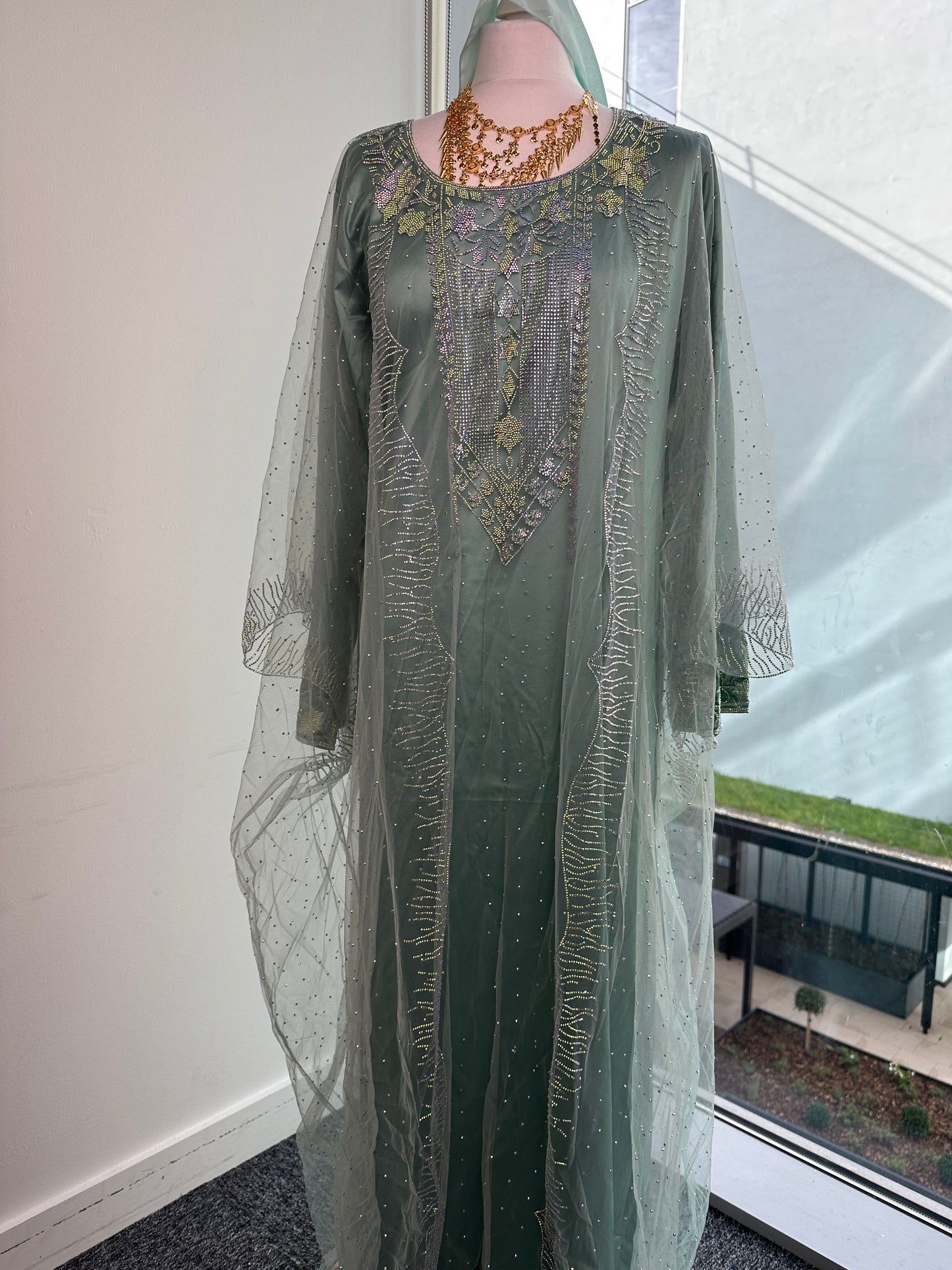 Light blue Emirati thobe with matching Sheila