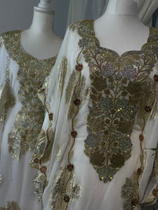 White and gold Emirati and Arabic dress, two pieces