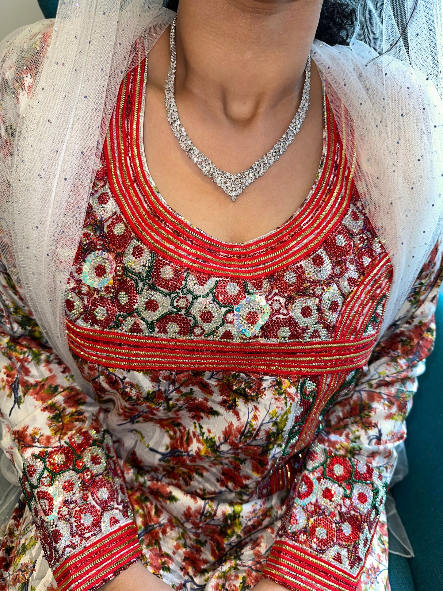 Red mkhawar with Arabic sleeves