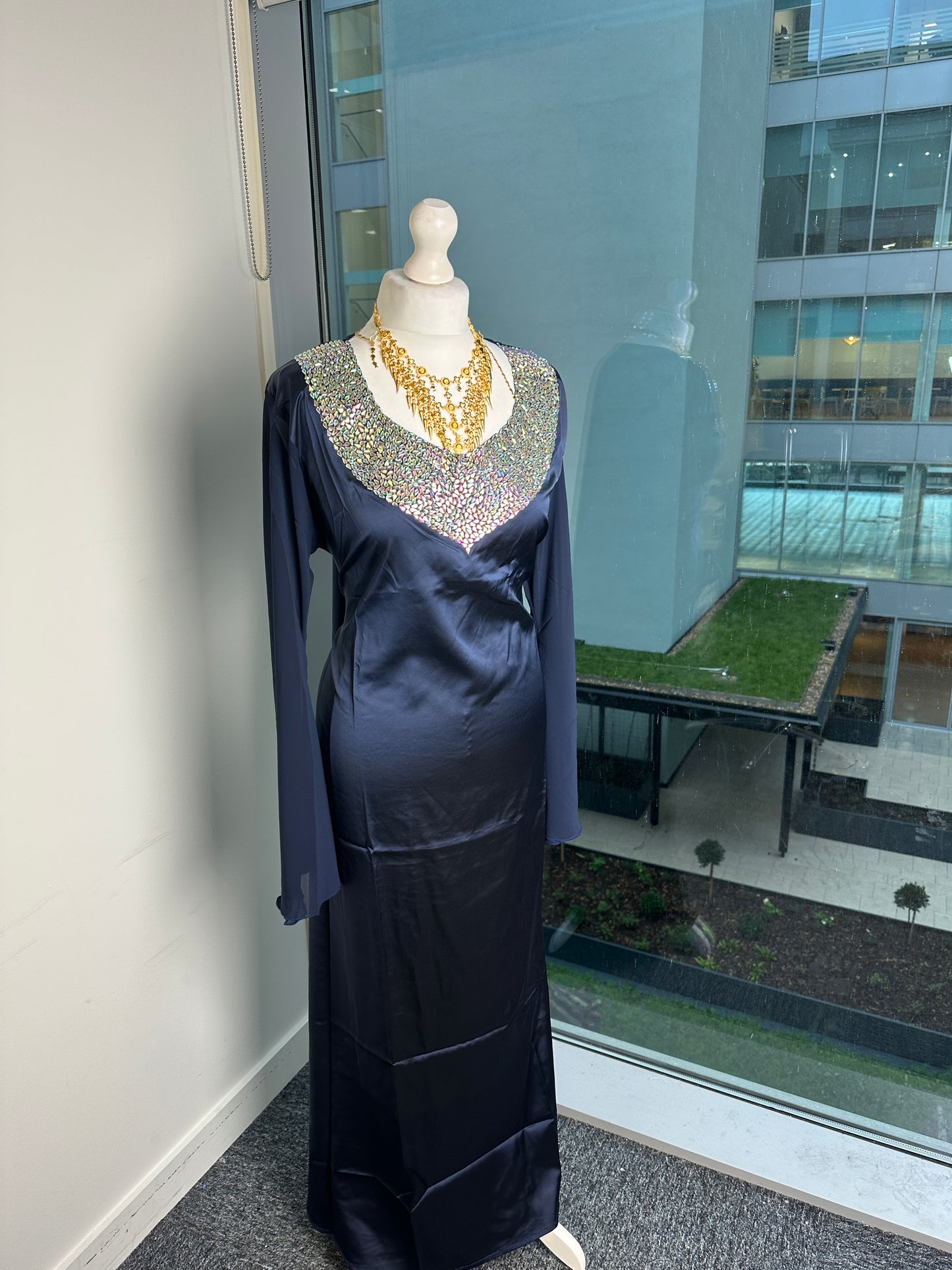 Navy blue low cut silk dress with chiffon sleeves with pockets