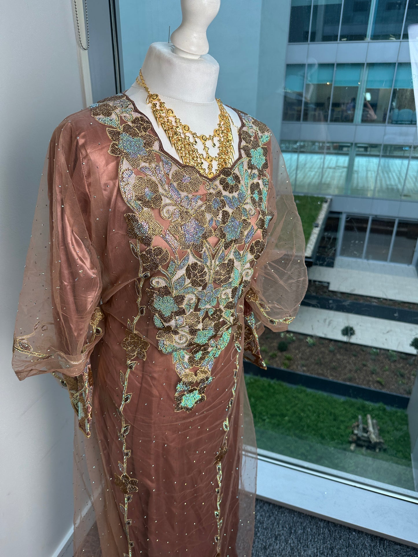 Rose gold Emirati thobe with belt