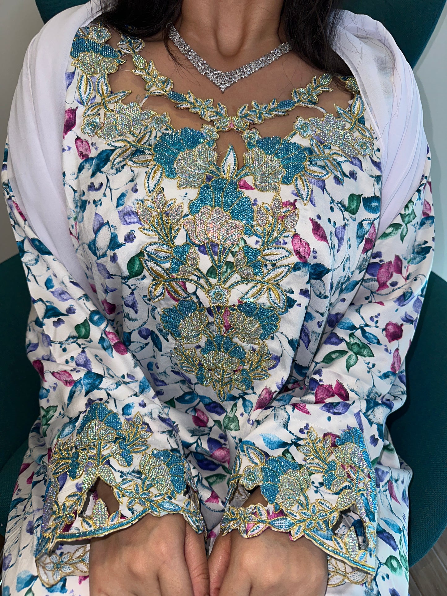 White and blue mkhawar with matching Shiela