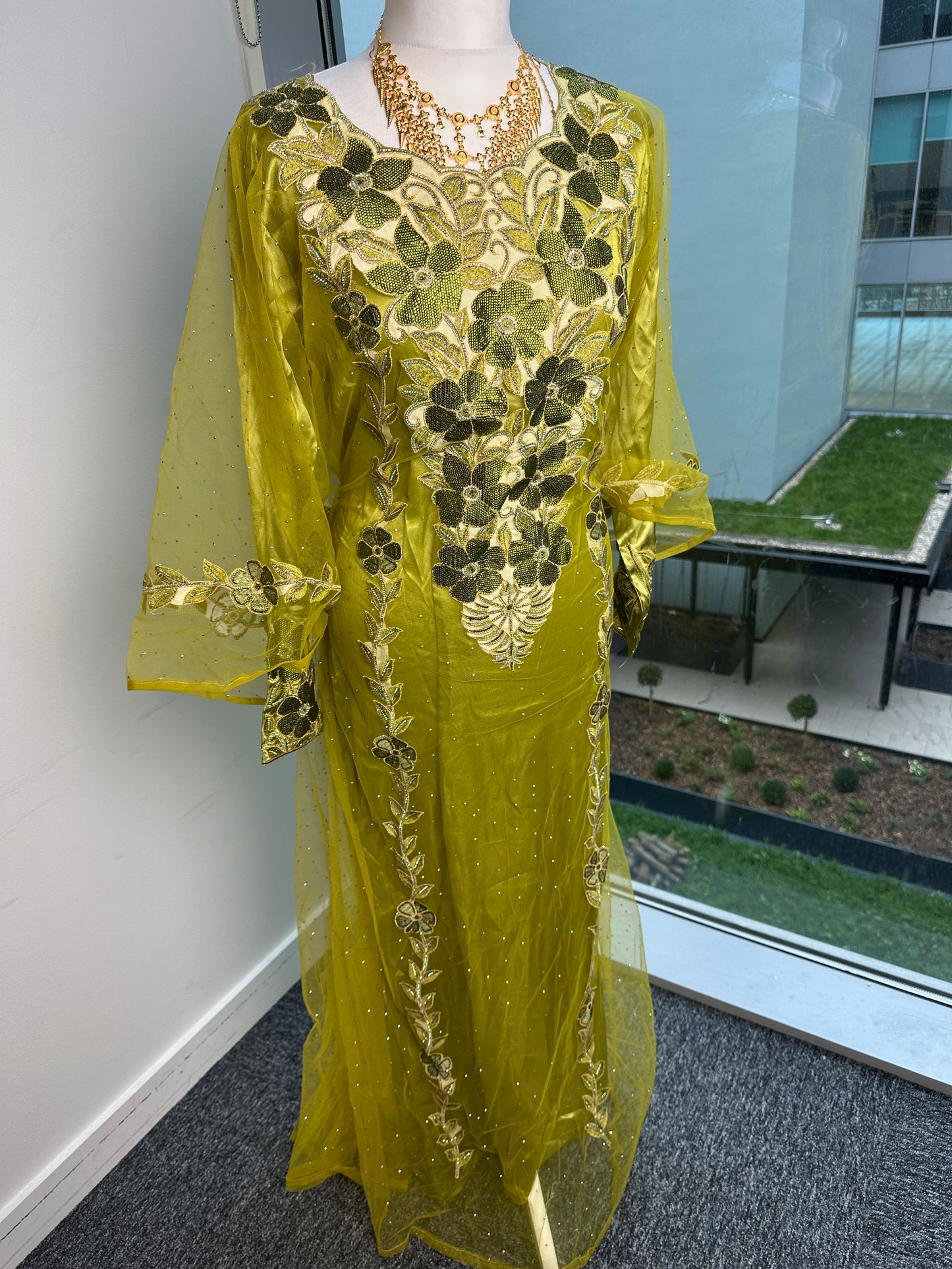 Lime green Emirati thobe with belt