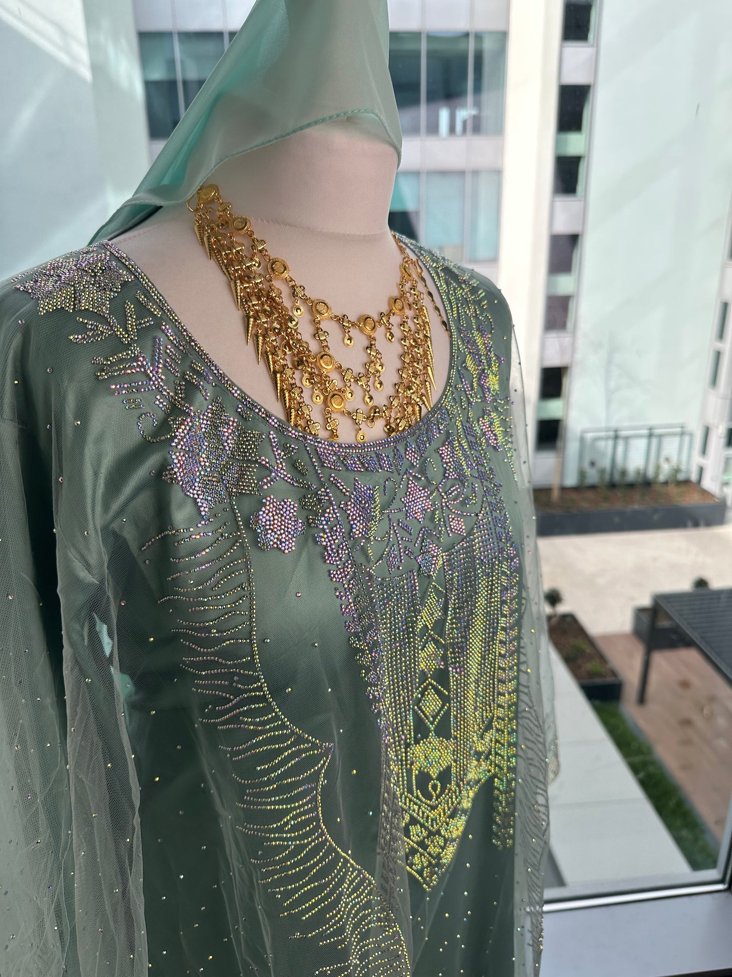 Light blue Emirati thobe with matching Sheila
