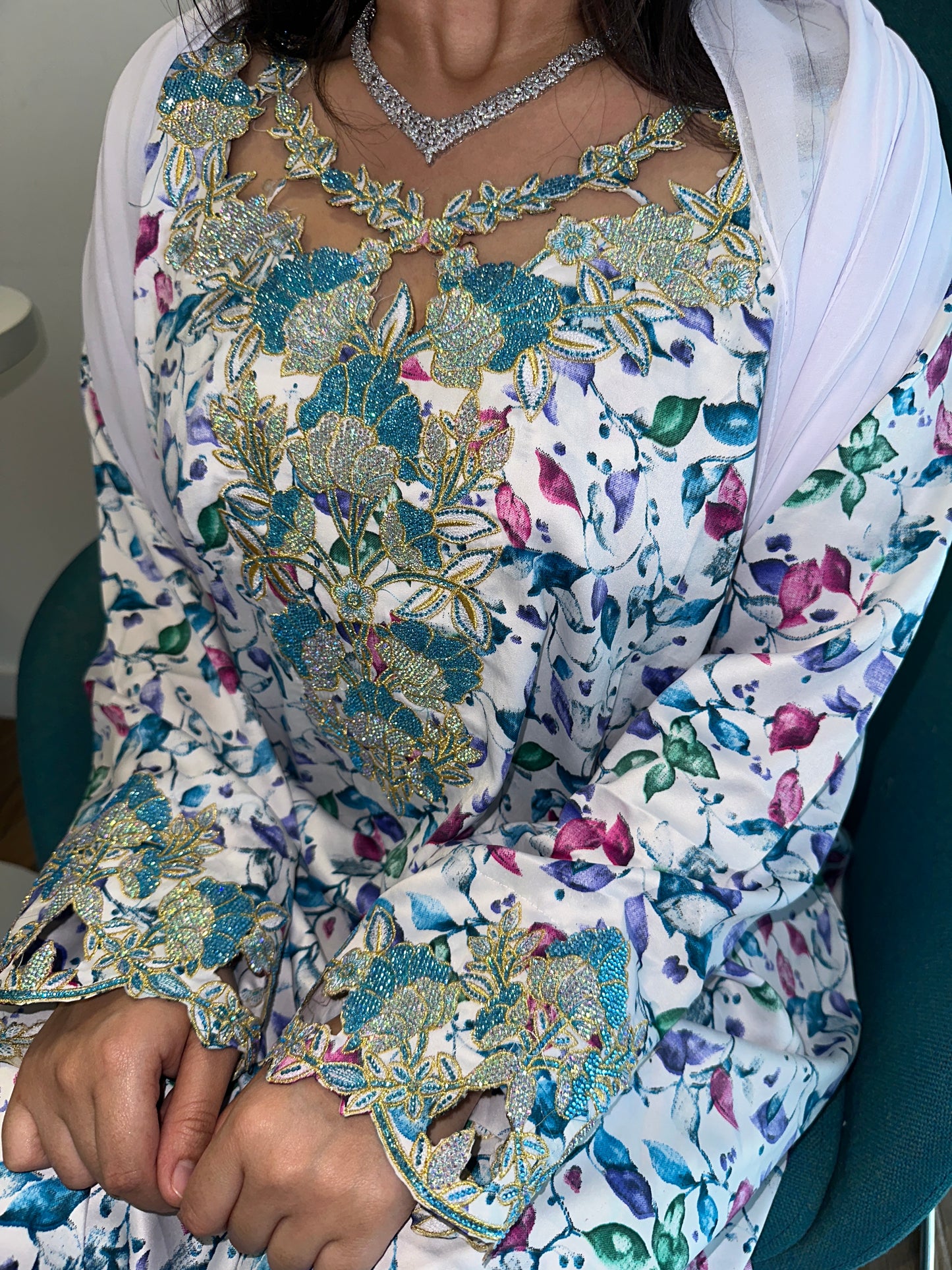 White and blue mkhawar with matching Shiela