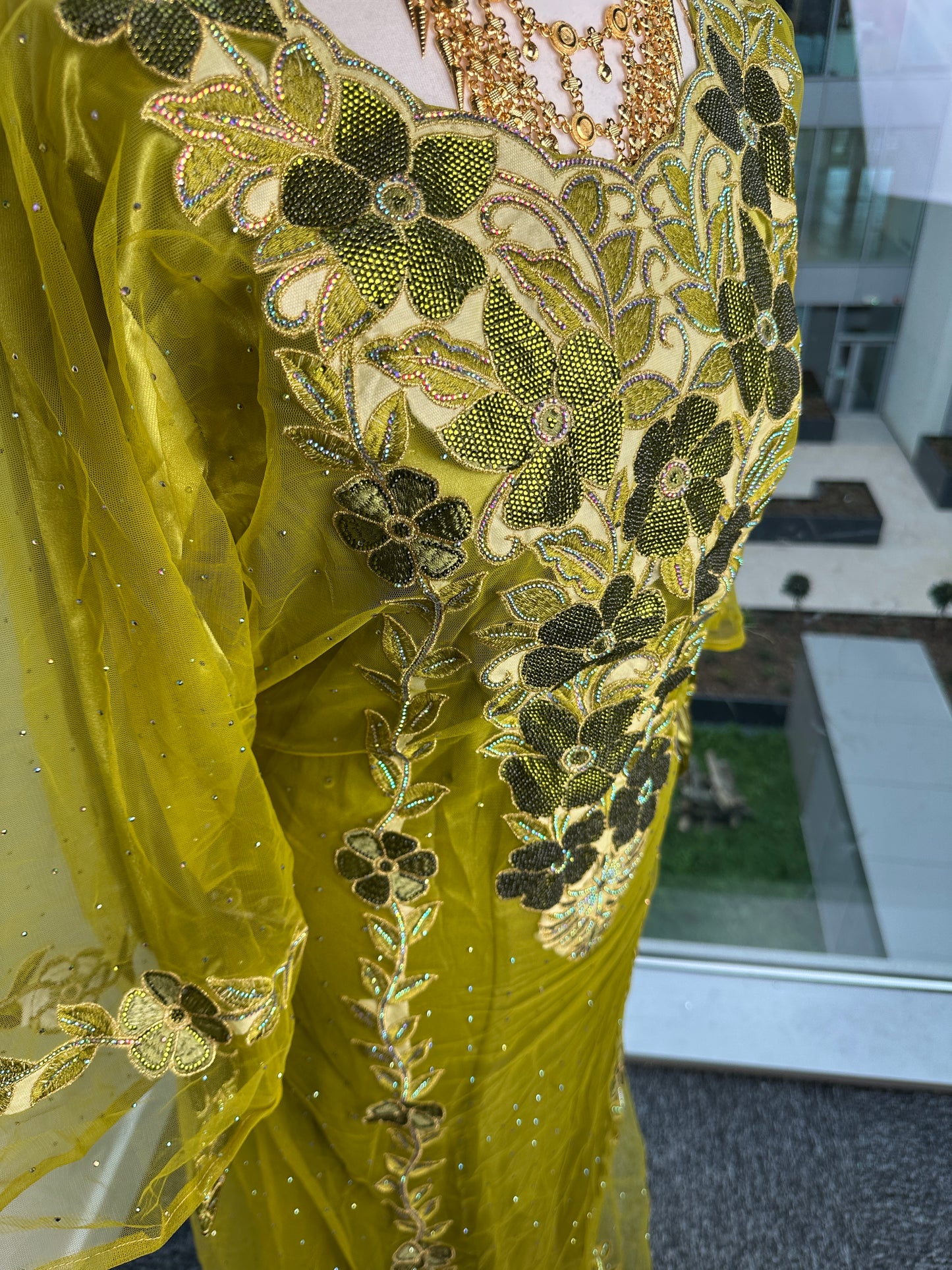 Lime green Emirati thobe with belt