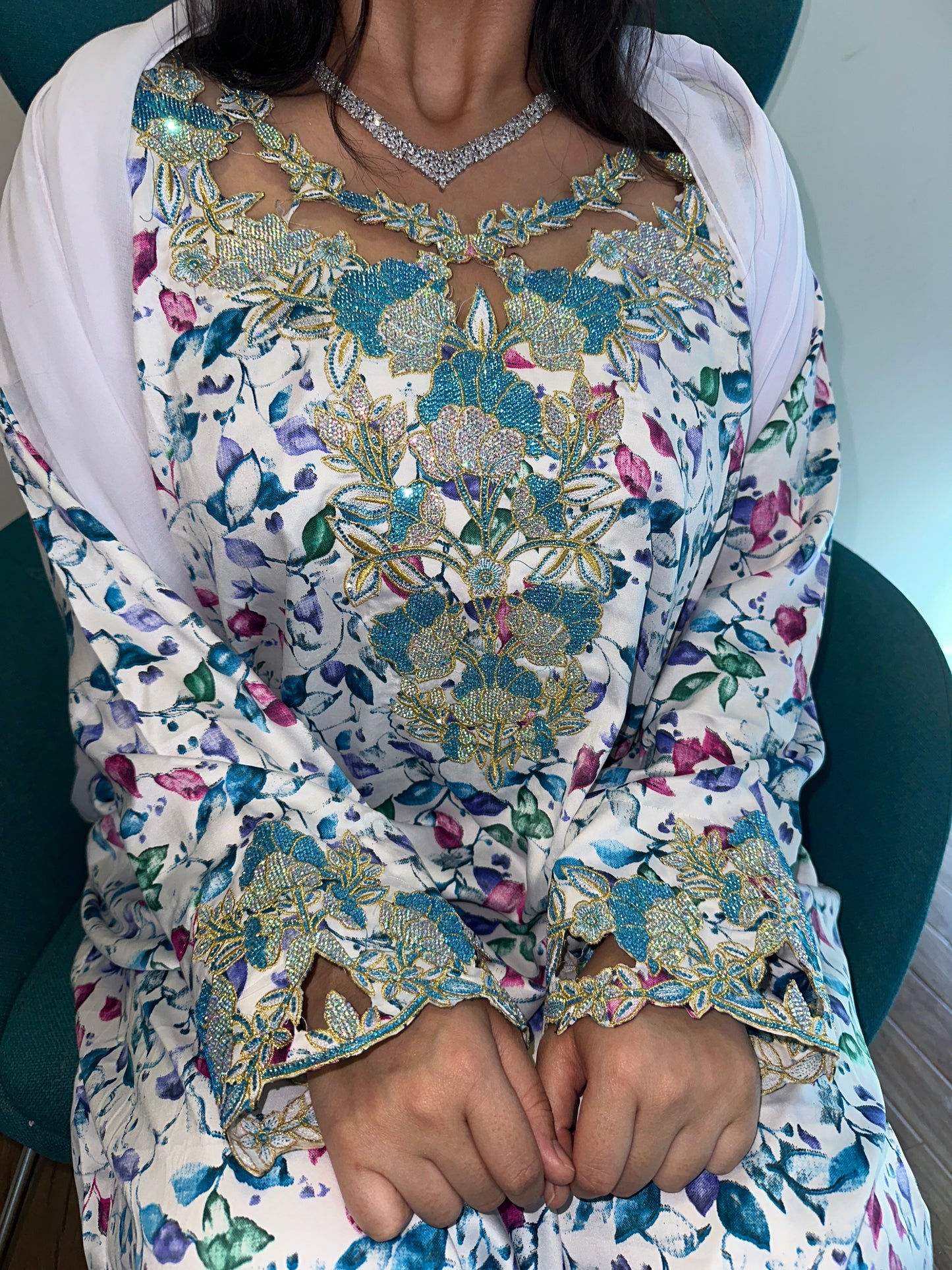 White and blue mkhawar with matching Shiela