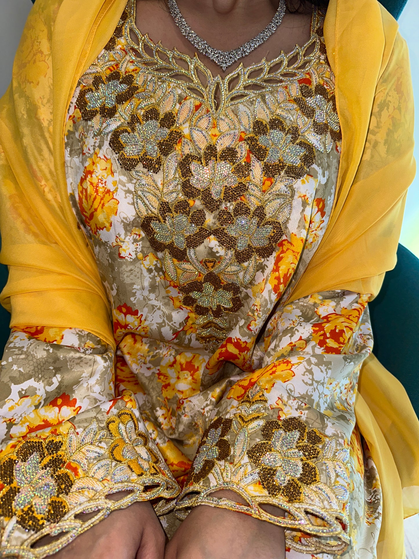 Yellow and cream mkhawar with matching Shiela