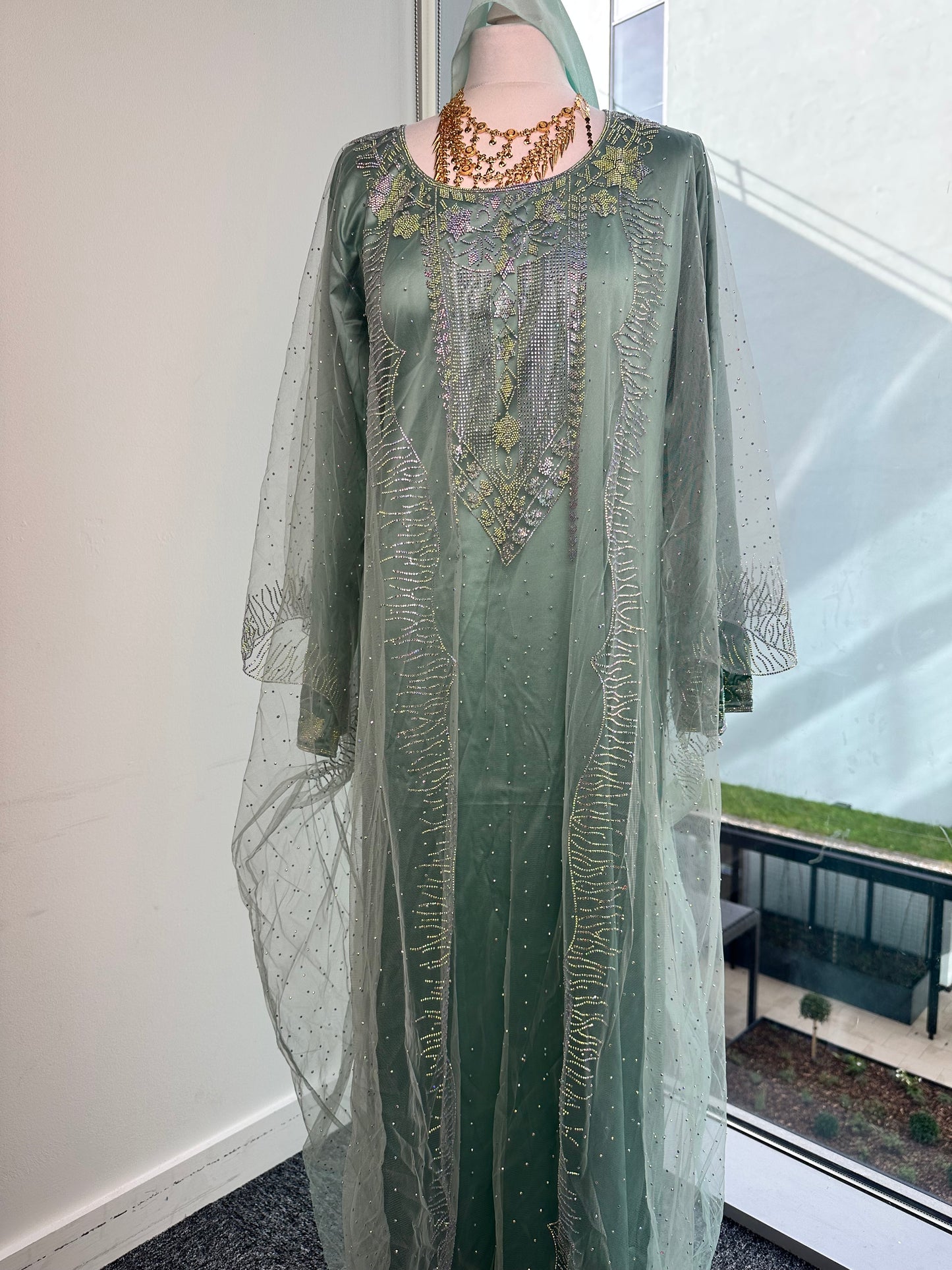 Light blue Emirati thobe with matching Sheila