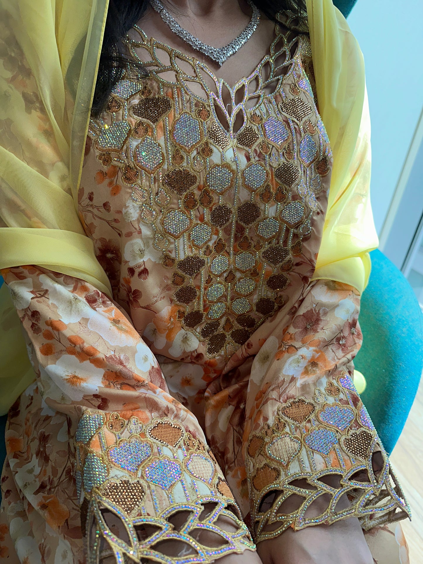 Brown and orange mkhawar with matching Shiela