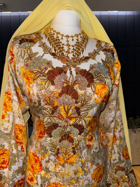 Orange and yellow mkhawar with matching Sheila hijab