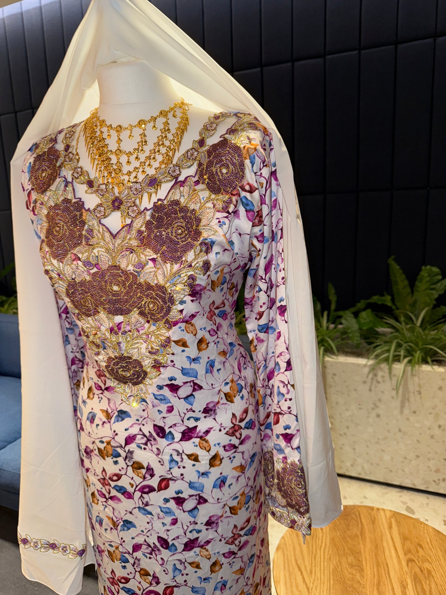 Purple and white mkhawar with hijab