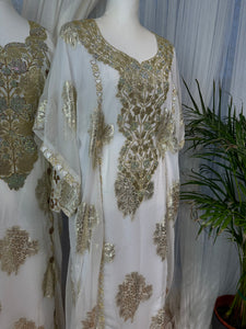 White and gold Emirati and Arabic dress two pieces