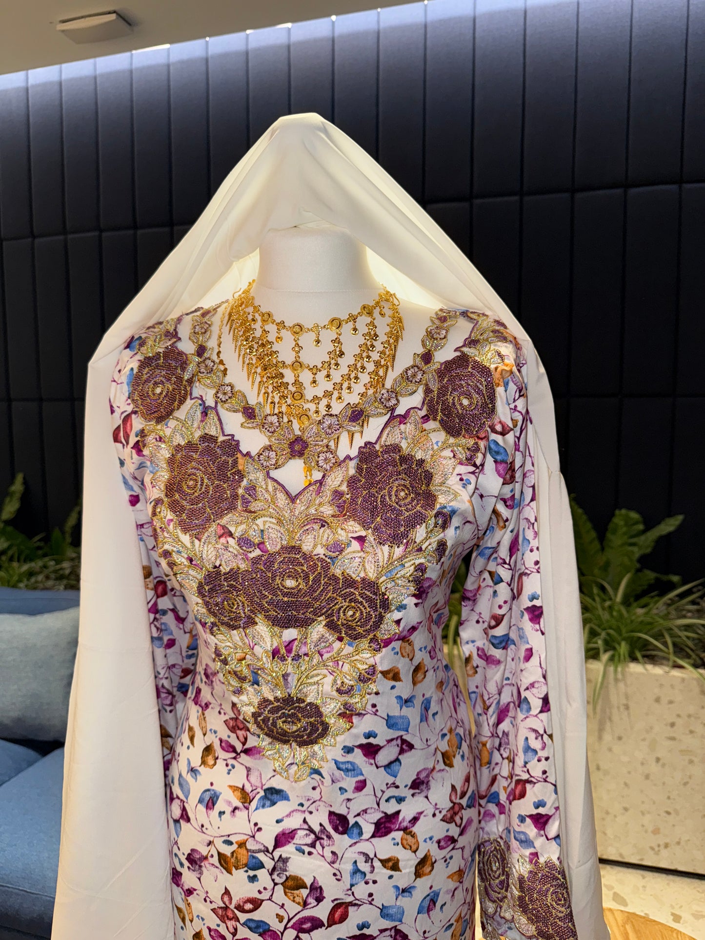 Purple and white mkhawar with hijab